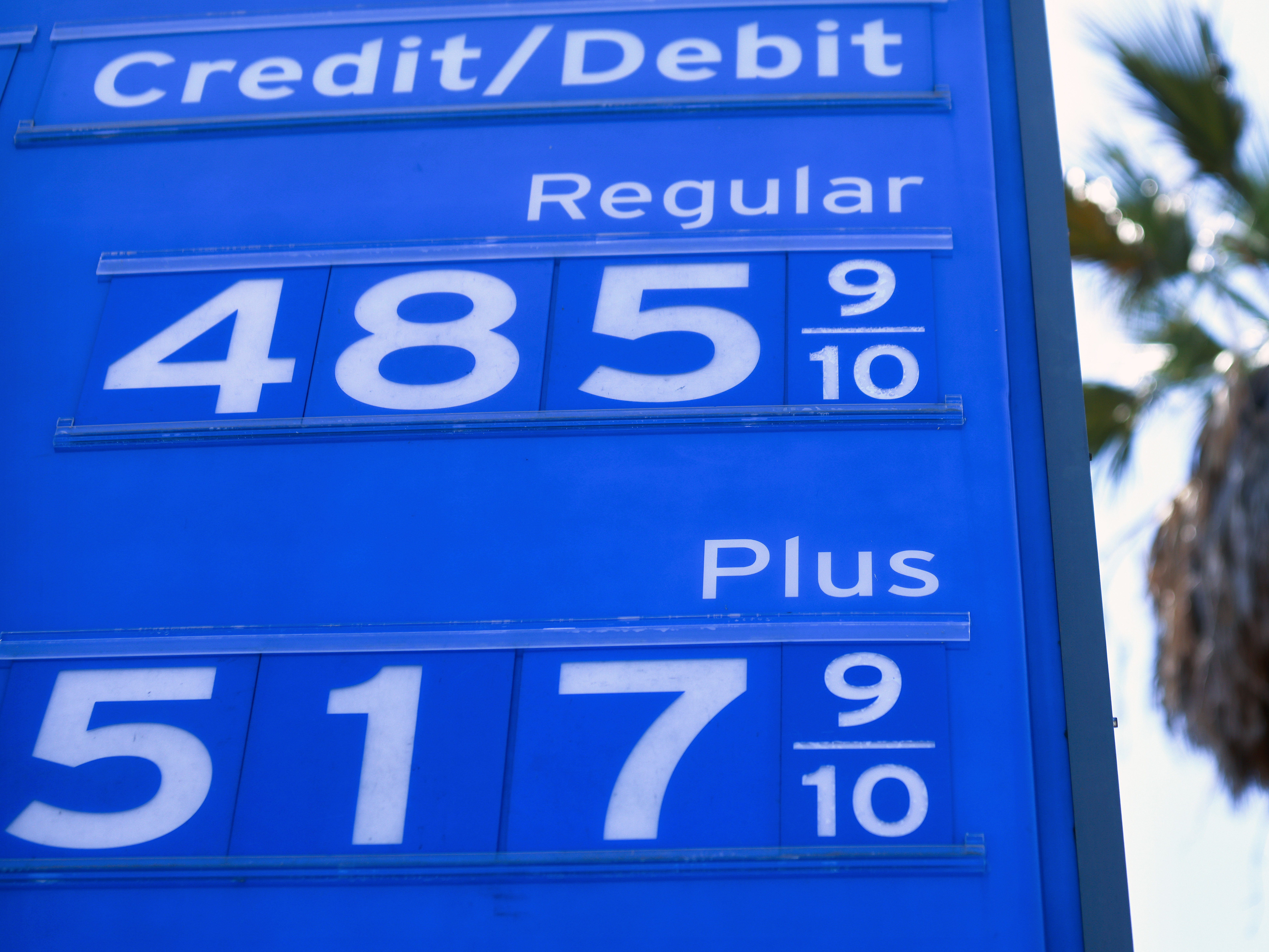 caption: Gas prices are displayed at a Chevron station on June 14 in Los Angeles. A meeting of the oil cartel known as OPEC+ ended in drama, leading to intense volatility in crude prices.
