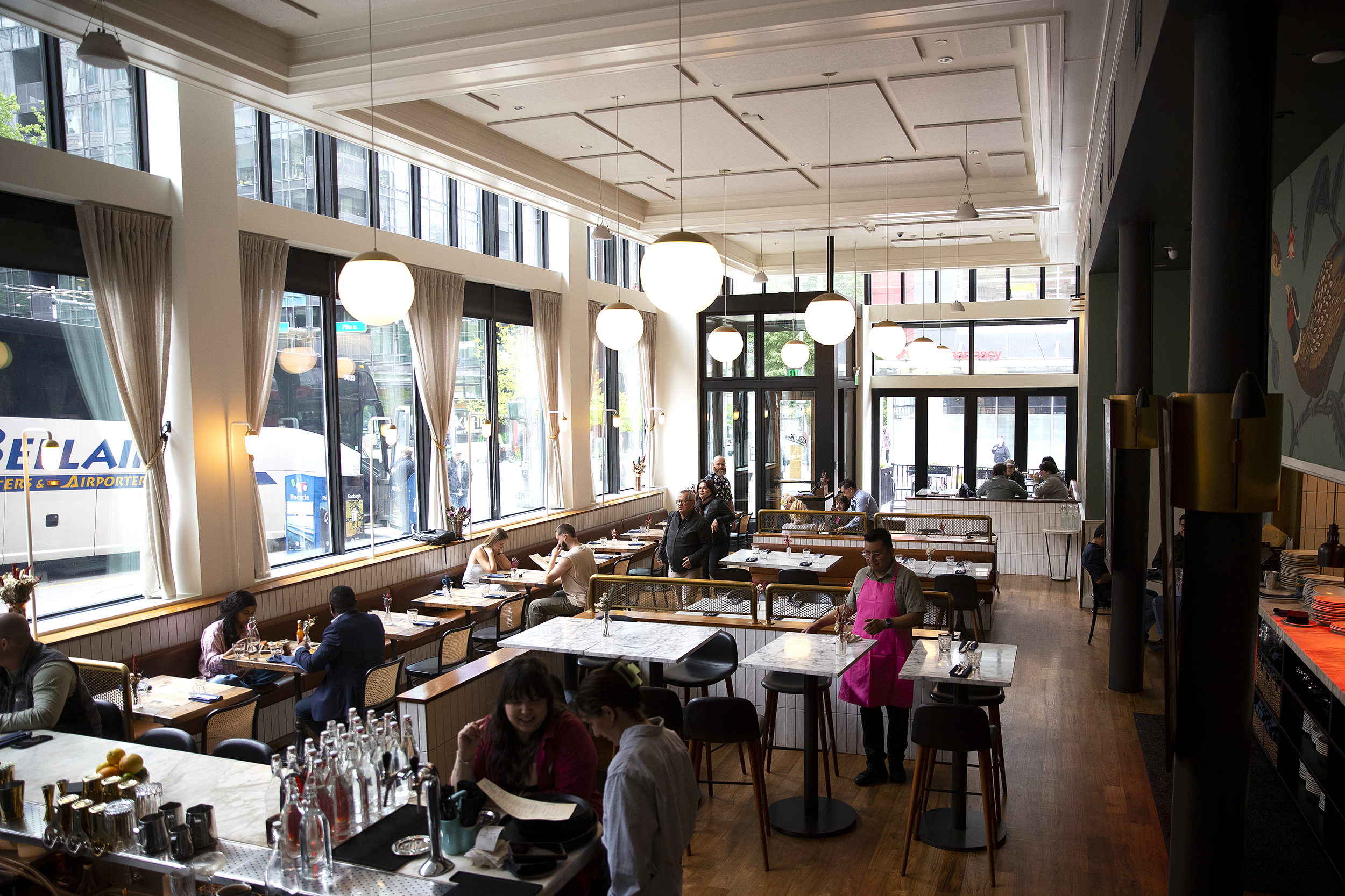 caption: The dining area of the State Hotel is shown on Friday, May 8, 2026, in Seattle. 
