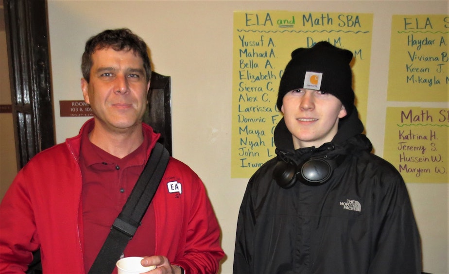 caption: The author, right, with his teacher, Shawn Kamp.