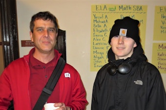 caption: The author, right, with his teacher, Shawn Kamp.