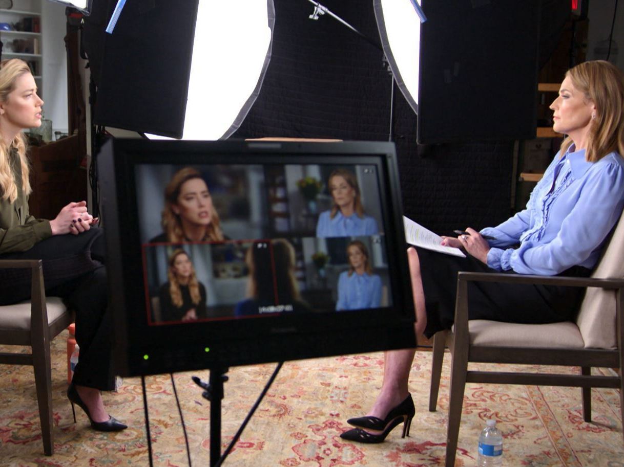 caption: Journalist Savannah Guthrie, right, during an exclusive interview with actor Amber Heard.