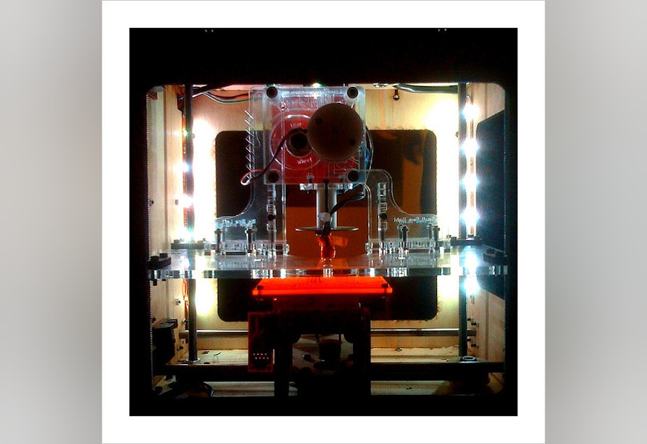 caption: A 3-D printer.