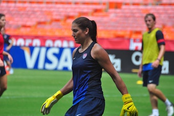 caption: Hope Solo with the U.S. National Team.
