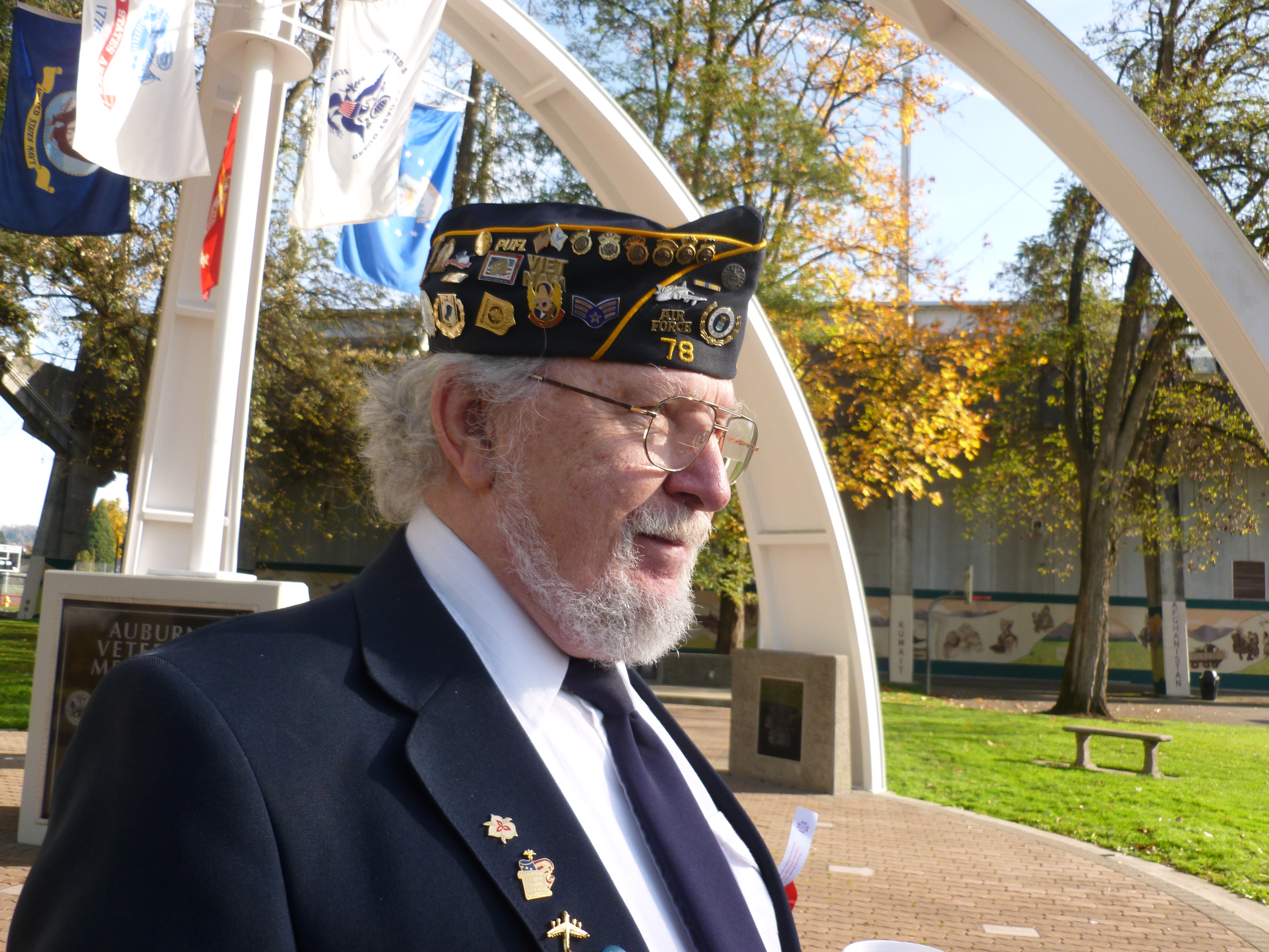 caption: Bob Poznanski of American Legion Auburn Post 78 shows off his hat. 