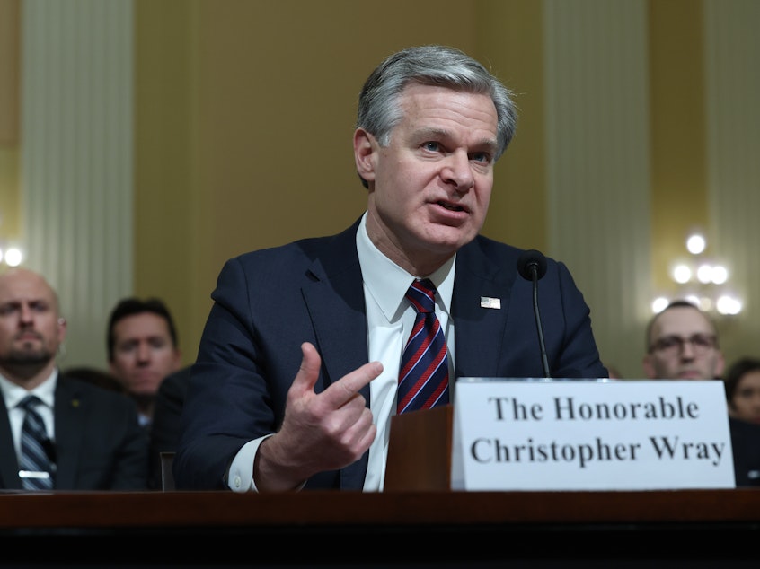 caption: FBI Director Christopher Wray testifies before the House Select Strategic Competition Between the United States and the Chinese Communist Party Committee on Wednesday.