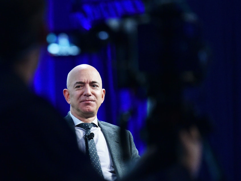 caption: "A next step in protecting our employees might be regular testing of all Amazonians, including those showing no symptoms," Amazon CEO Bezos wrote on Thursday.