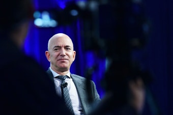 caption: "A next step in protecting our employees might be regular testing of all Amazonians, including those showing no symptoms," Amazon CEO Bezos wrote on Thursday.