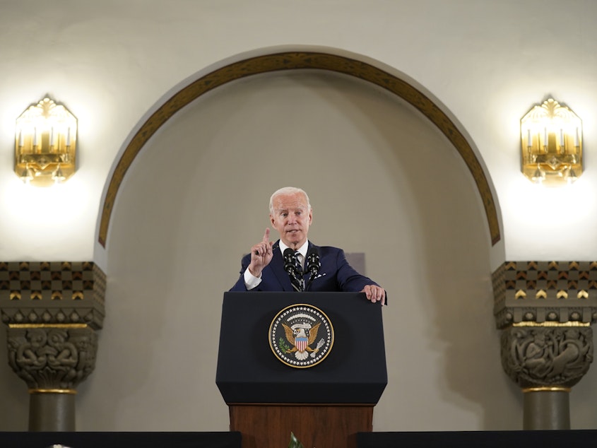 caption: U.S. President Joe Biden speaks at the Augusta Victoria Hospital in east Jerusalem on Friday. Biden announced a U.S. investment of $100 million for a network of hospitals.