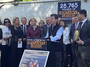 caption: Matt Capelouto, whose daughter died from a fentanyl overdose, speaks at a news conference outside the Capitol in Sacramento, Calif., Tuesday, April 18, 2023. Capelouto is among dozens of protesters who called on the Assembly to hear fentanyl-related bills as tension mounts over how to address the fentanyl crisis. (AP Photo/Tran Nguyen)