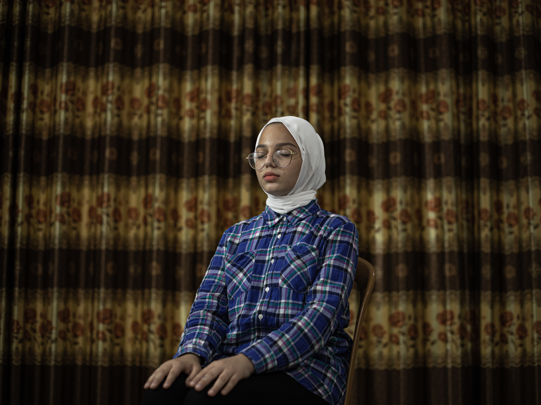 caption: Teenager Sama Ahel was taught deep breathing to cope following the Gaza-Israel conflict in May.