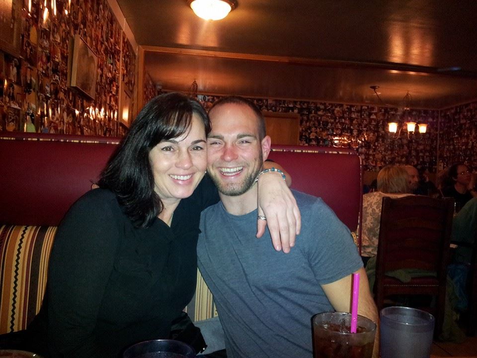 caption: Rhonda Johnson with her son Brandon Bielen who was severely brain injured in a motorcyle accident in 2010.