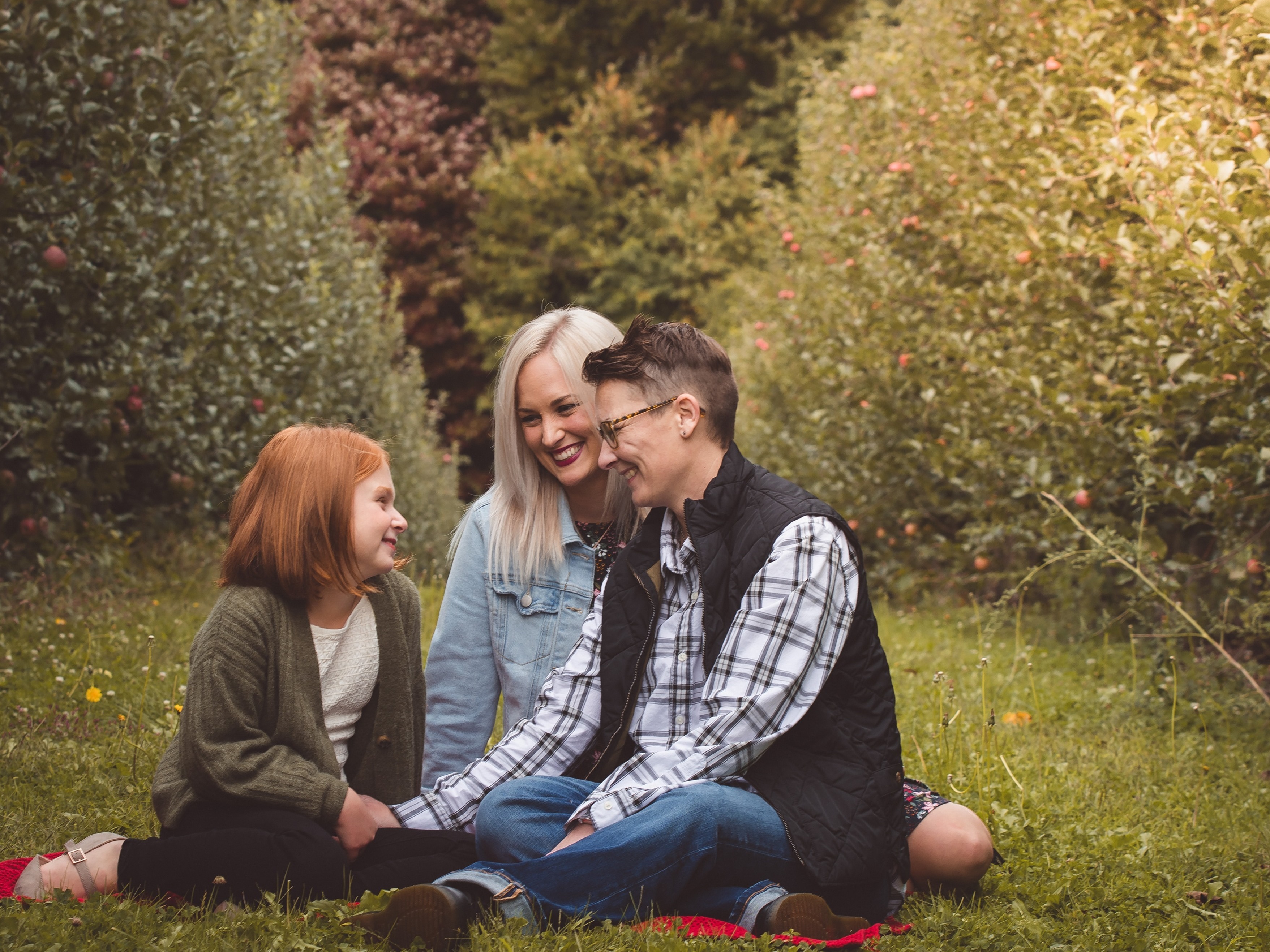 caption: Beth McDonough (center) with her wife and stepdaughter. "Whether it's right or wrong, we still look to the president's family and the vice president's family as a representation of what the quintessential American family looks like," said McDonough.