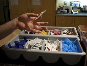 caption: Supervised injection sites, like Insite in Vancouver, Canada, provide drug users with clean needles and other supplies to help prevent the spread of disease.