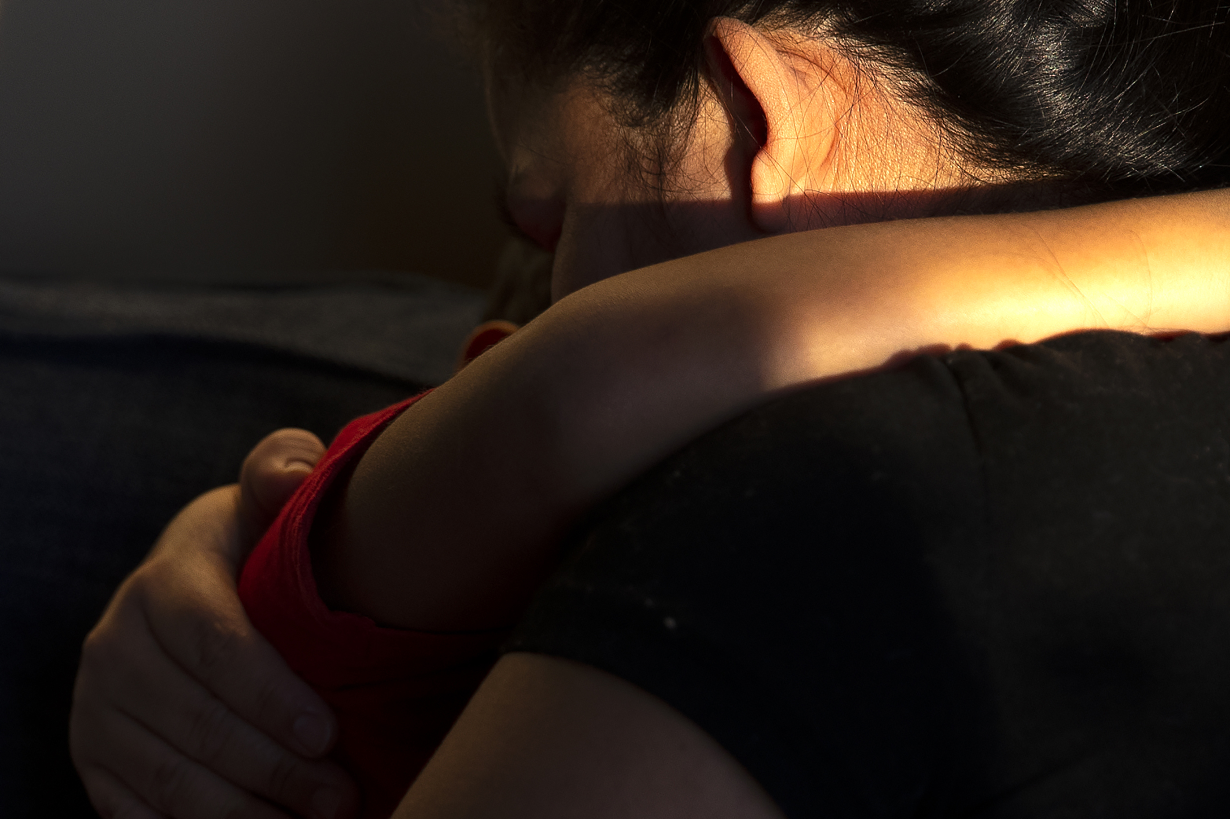 caption: Alejandra hugs her son, age 6, at Karina’s home on Friday, January 23, 2026, in Seattle. 