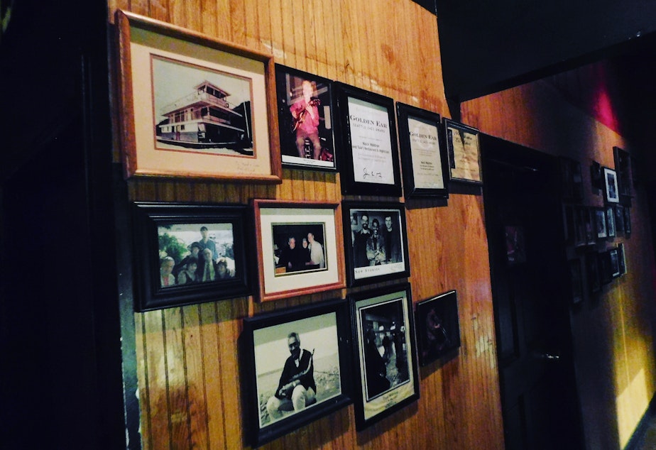 caption: Photo's of past performers in Tula's space 