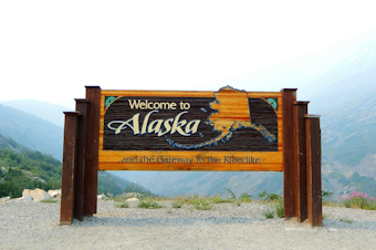 caption: Since the early 1980s, Alaska has sent check to residents every October, generally for around $1,000 or $2,000 as part of its Public Dividend Fund, which has been looked to as a form of basic income. 