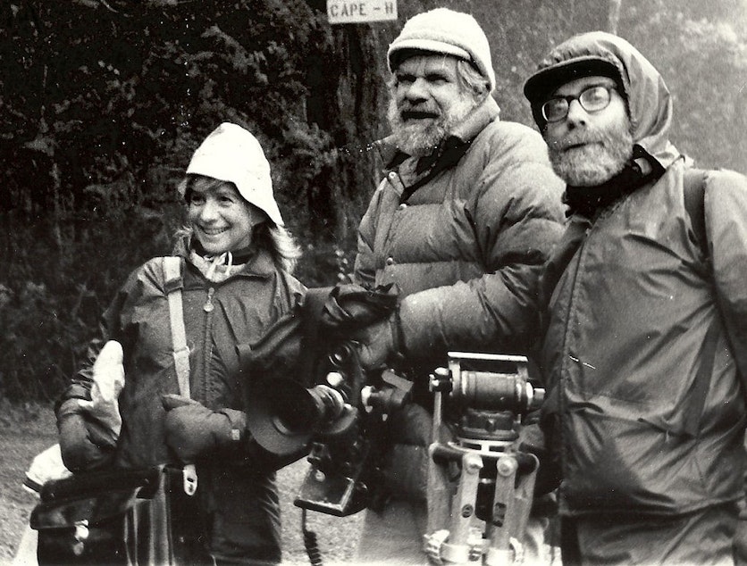 caption: Jean Walkinshaw (far left) with photographer Wayne Sourbeer and writer Ivan Doig.