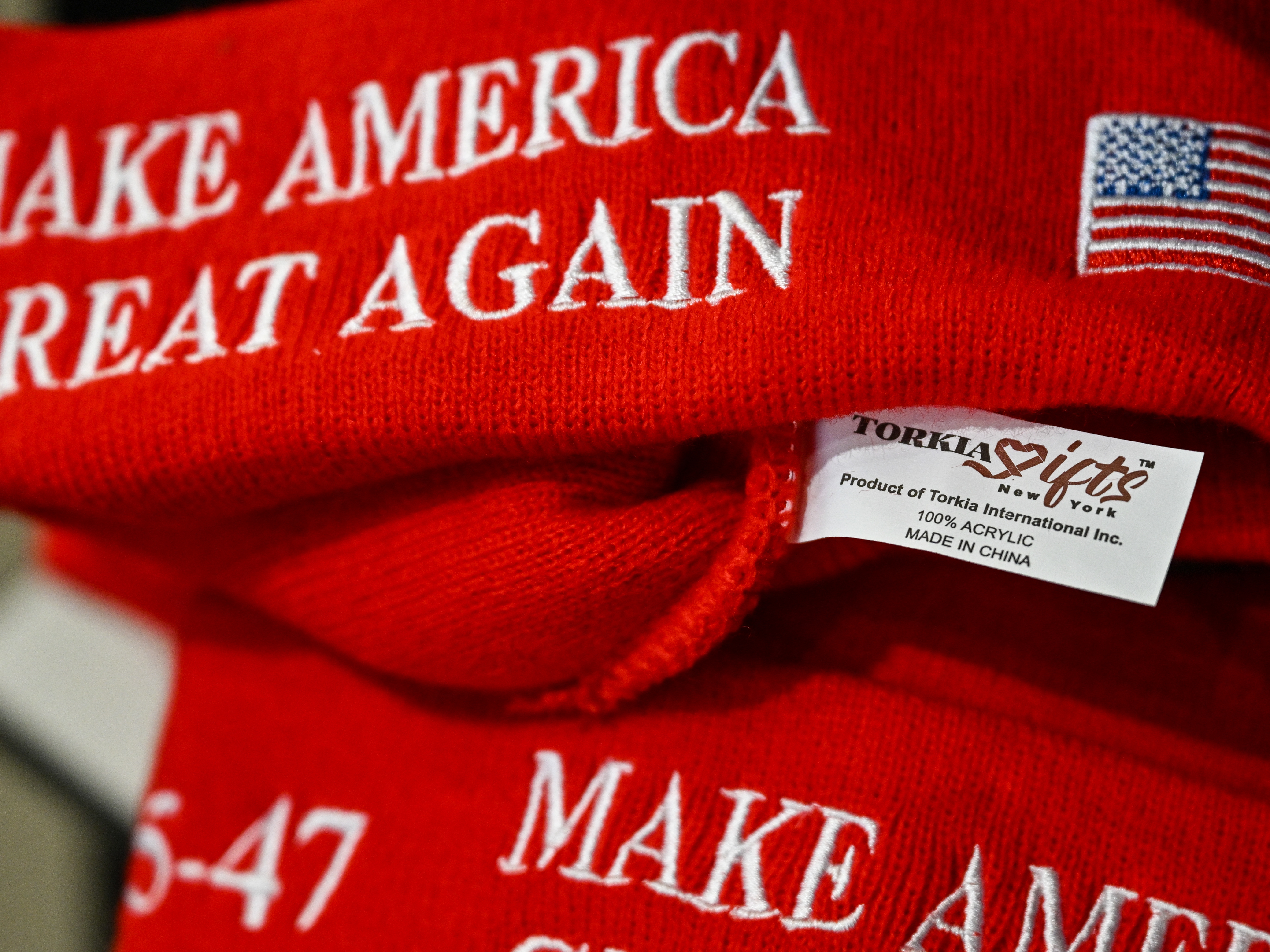 caption: President Trump hopes to encourage more U.S. manufacturing with his import taxes on foreign goods. But an online experiment suggests most people aren't willing to pay a premium for a "Made in the USA" product.