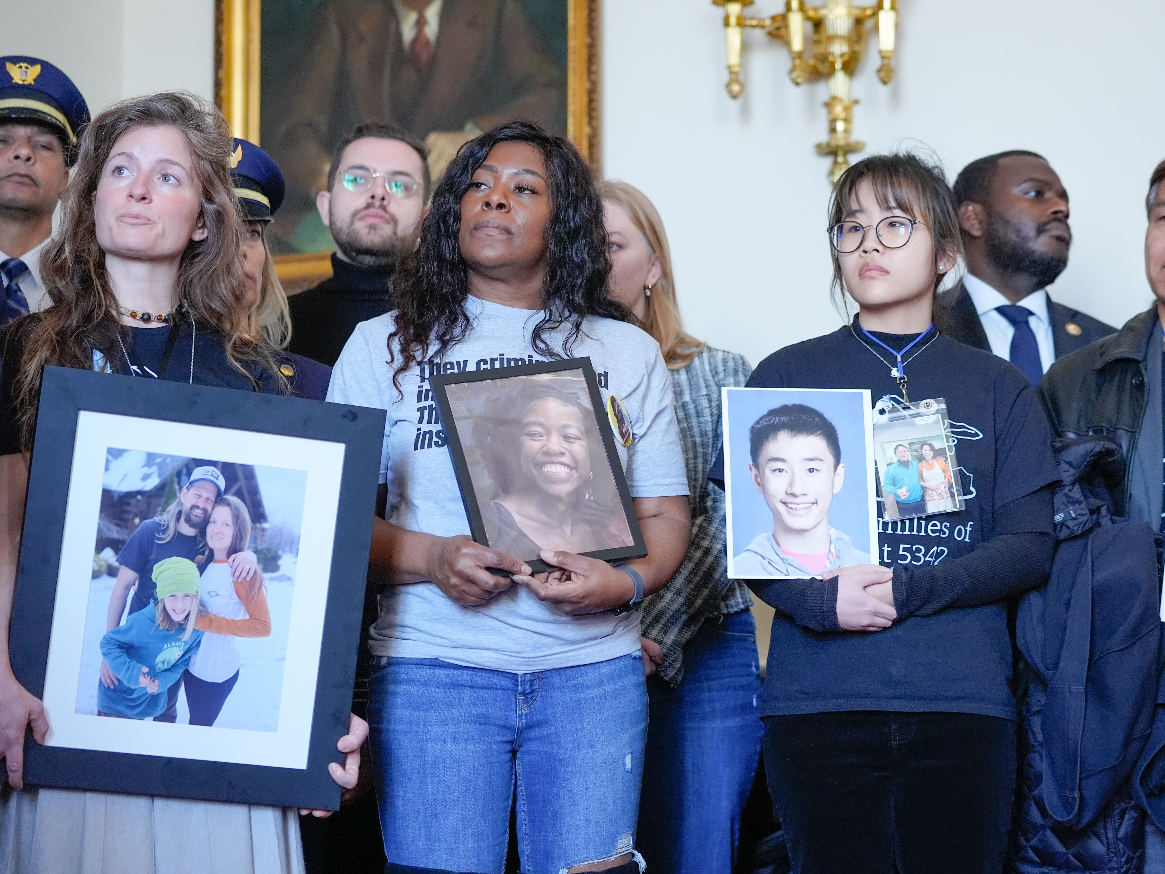 caption: Family members of the people who were killed in the midair collision near Ronald Reagan Washington National Airport listen during a news conference ahead of a vote on an aviation safety bill on Capitol Hill on Tuesday in Washington.