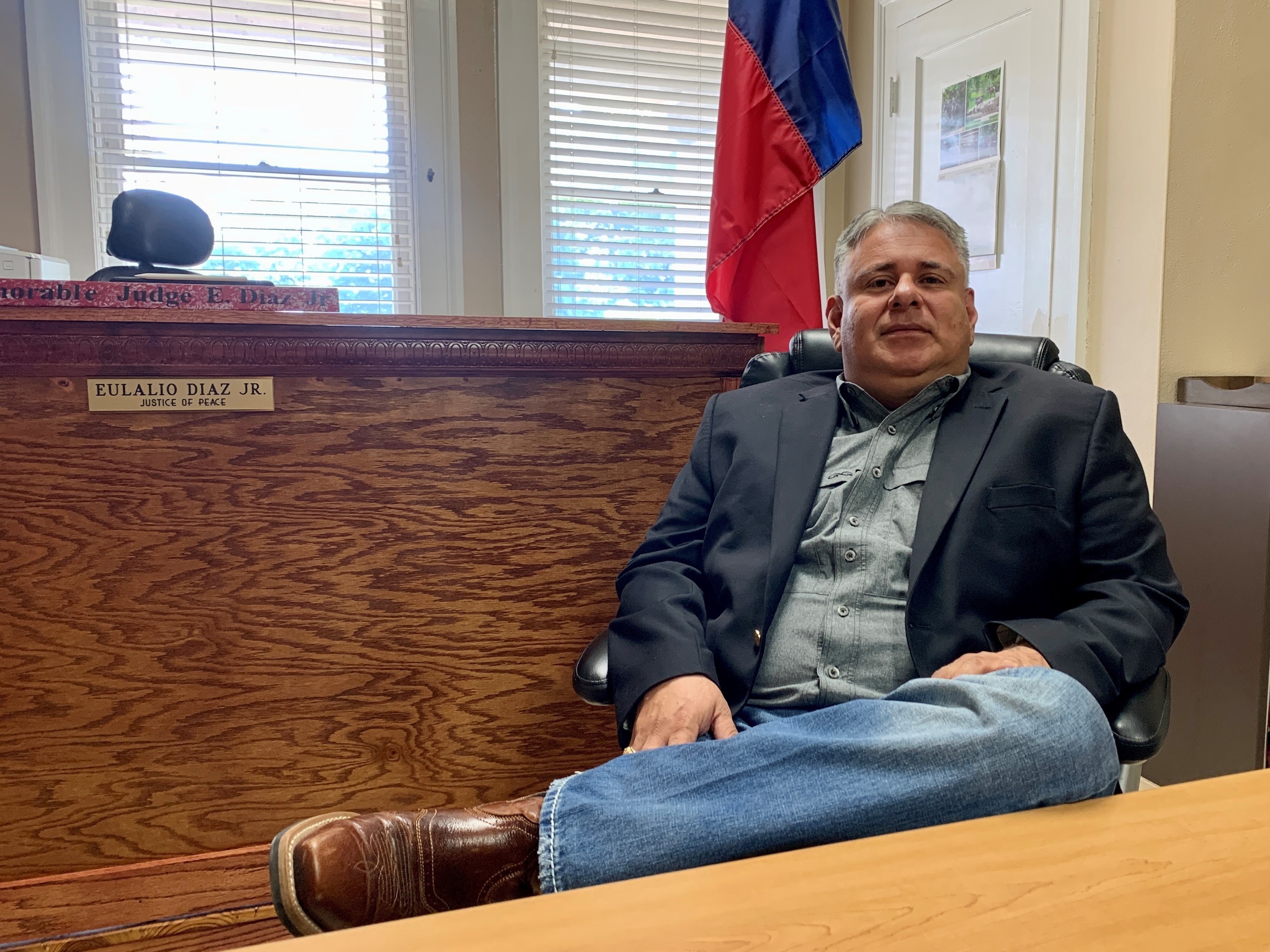 caption: Justice of the Peace Eulalio Diaz, Jr., was called to identify the bodies of the 21 victims of the shooting at Robb Elementary, last week.