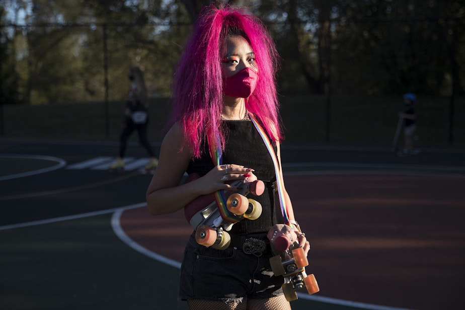 caption: Naima Pai, co-founder of Seattle Skates, stands for a portrait on Tuesday, October 6, 2020, during a decades themed skate meet up at the White Center Bicycle Playground in Seattle. 