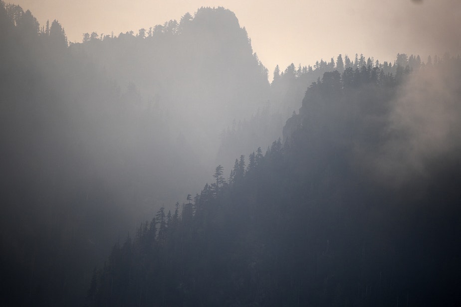 caption: Smoke from the Bolt Creek Fire is shown on Monday, September 12, 2022, along Reiter Road outside of Index. 