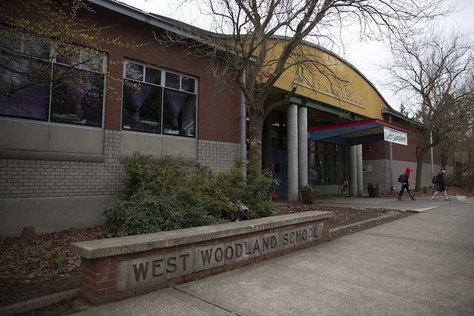caption: Students leave West Woodland Elementary School on Wednesday, February 12, 2020, in Seattle.