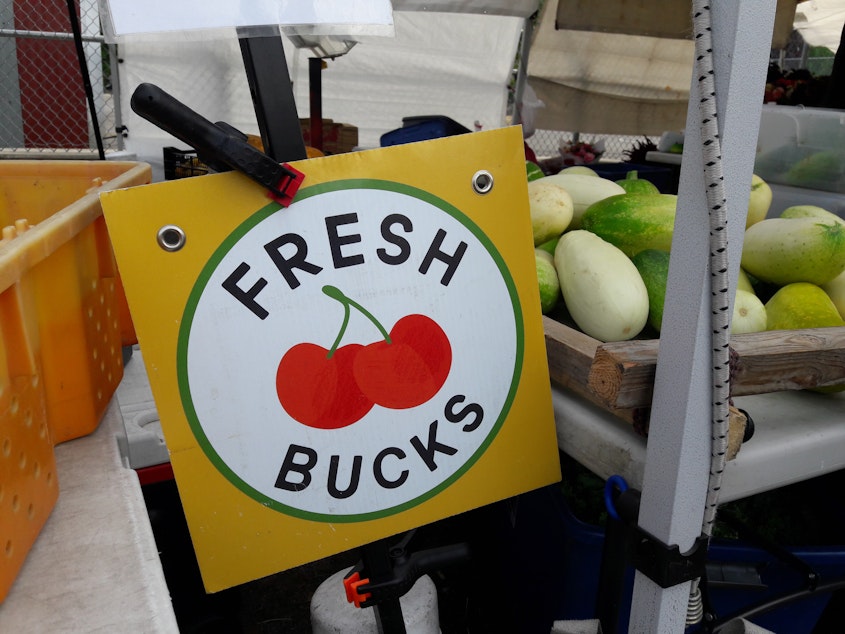 caption: The Fresh Bucks program helps low-income families stretch their food stamp benefits and buy fresh produce at Seattle farmer's markets. 