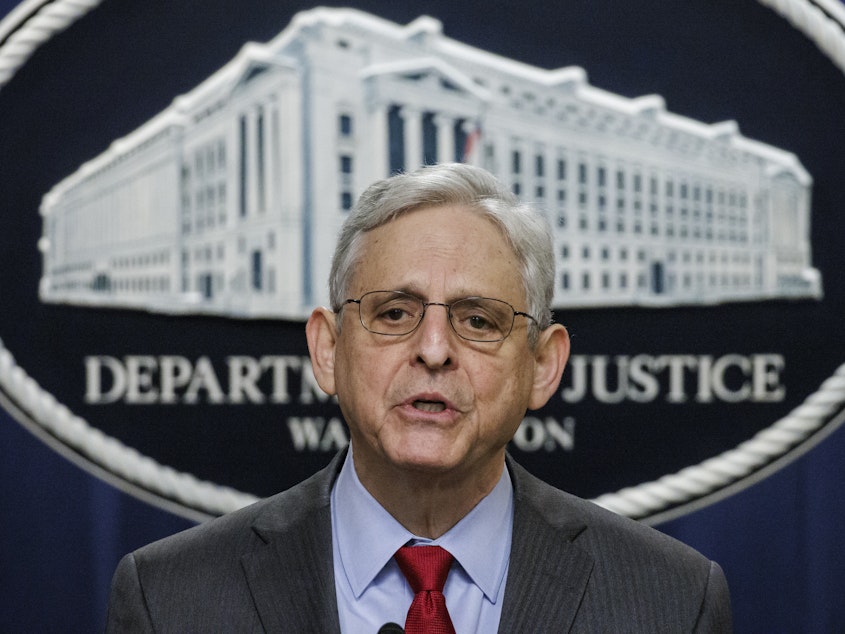 caption: U.S. Attorney General Merrick Garland speaks at a press conference on Dec. 6, 2023, about DOJ's indictment of four Russian military personnel for war crimes committed against a U.S. national living in Ukraine, the first of such charges ever to be brought under the U.S. war crimes statute.