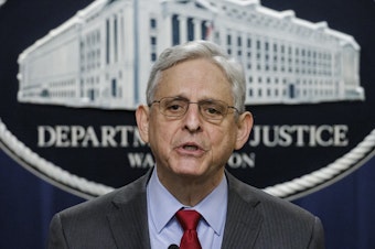 caption: U.S. Attorney General Merrick Garland speaks at a press conference on Dec. 6, 2023, about DOJ's indictment of four Russian military personnel for war crimes committed against a U.S. national living in Ukraine, the first of such charges ever to be brought under the U.S. war crimes statute.