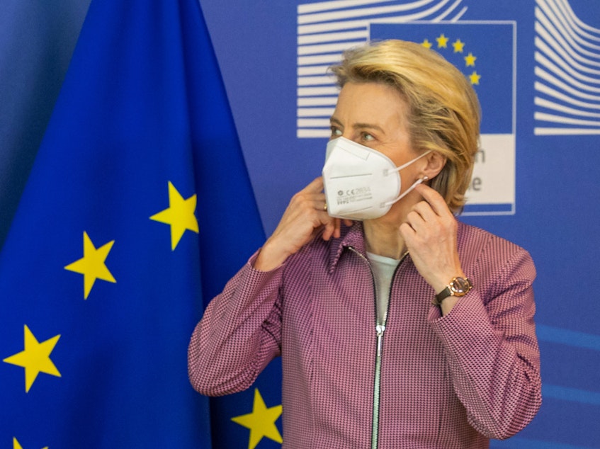 caption: Ursula von der Leyen, president of the European Commission, wears a protective mask during a meeting in Brussels last week.