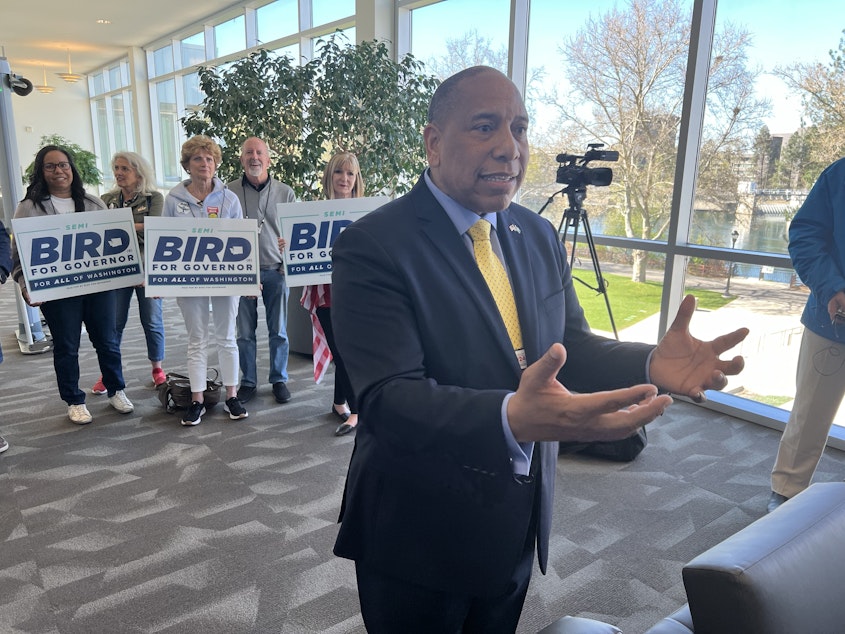 caption: Semi Bird, a former Richland school board member, speaks to reporters Saturday, April 20, 2024, after Republican party delegates vote to endorse him as the party's candidate.