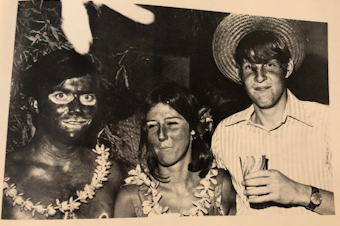 caption: A photo on the Phi Gamma Delta fraternity yearbook page from 1972 shows someone wearing blackface for a costume.