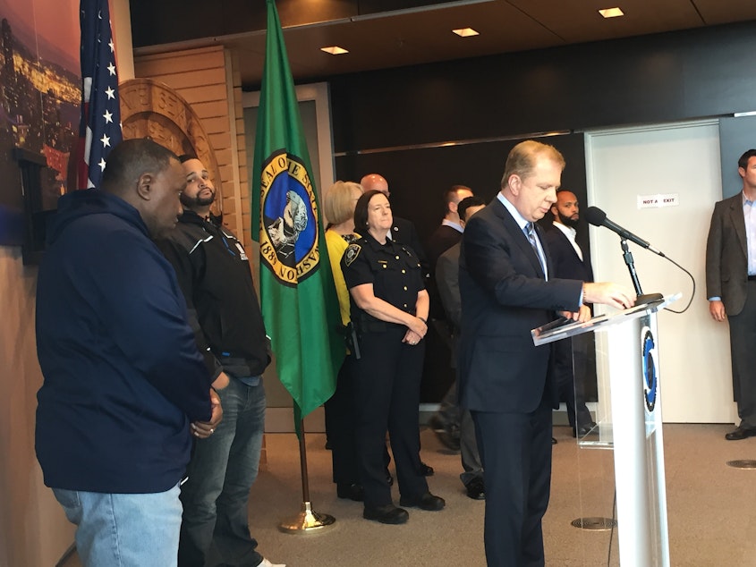 caption: Mayor Ed Murray and Police Chief Kathleen O'Toole address the social consequences of systematic racism at a press conference.