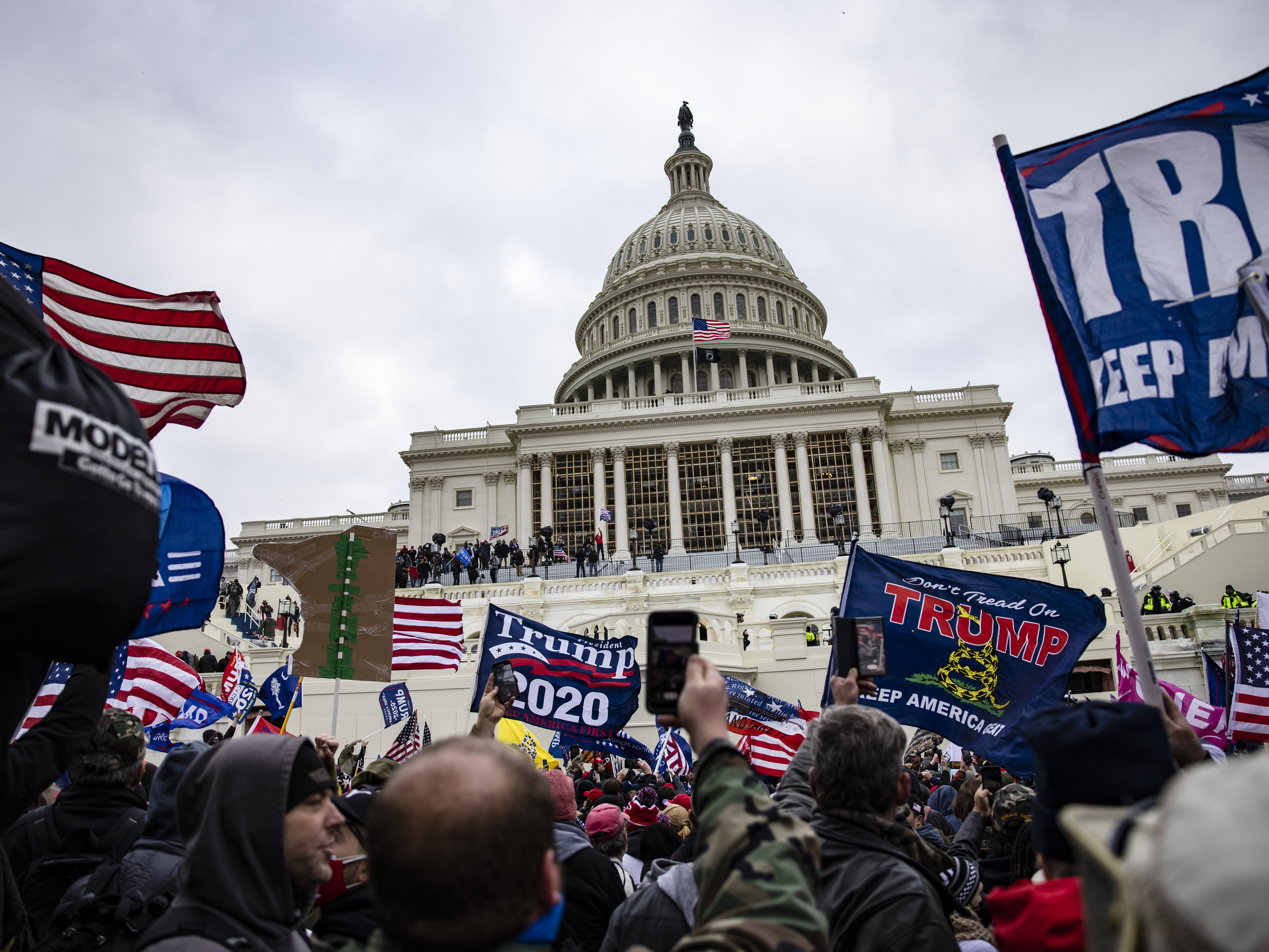 caption: Pro-Trump supporters storm the U.S. Capitol following a rally with President Donald Trump on January 6, 2021, in Washington, D.C. They later went on to break in and attempt to stop the certification of the 2020 presidential election results.