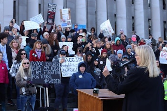 caption: <p>Anti-vaccine advocates rally outside the Washington State Capitol in Olympia.</p>