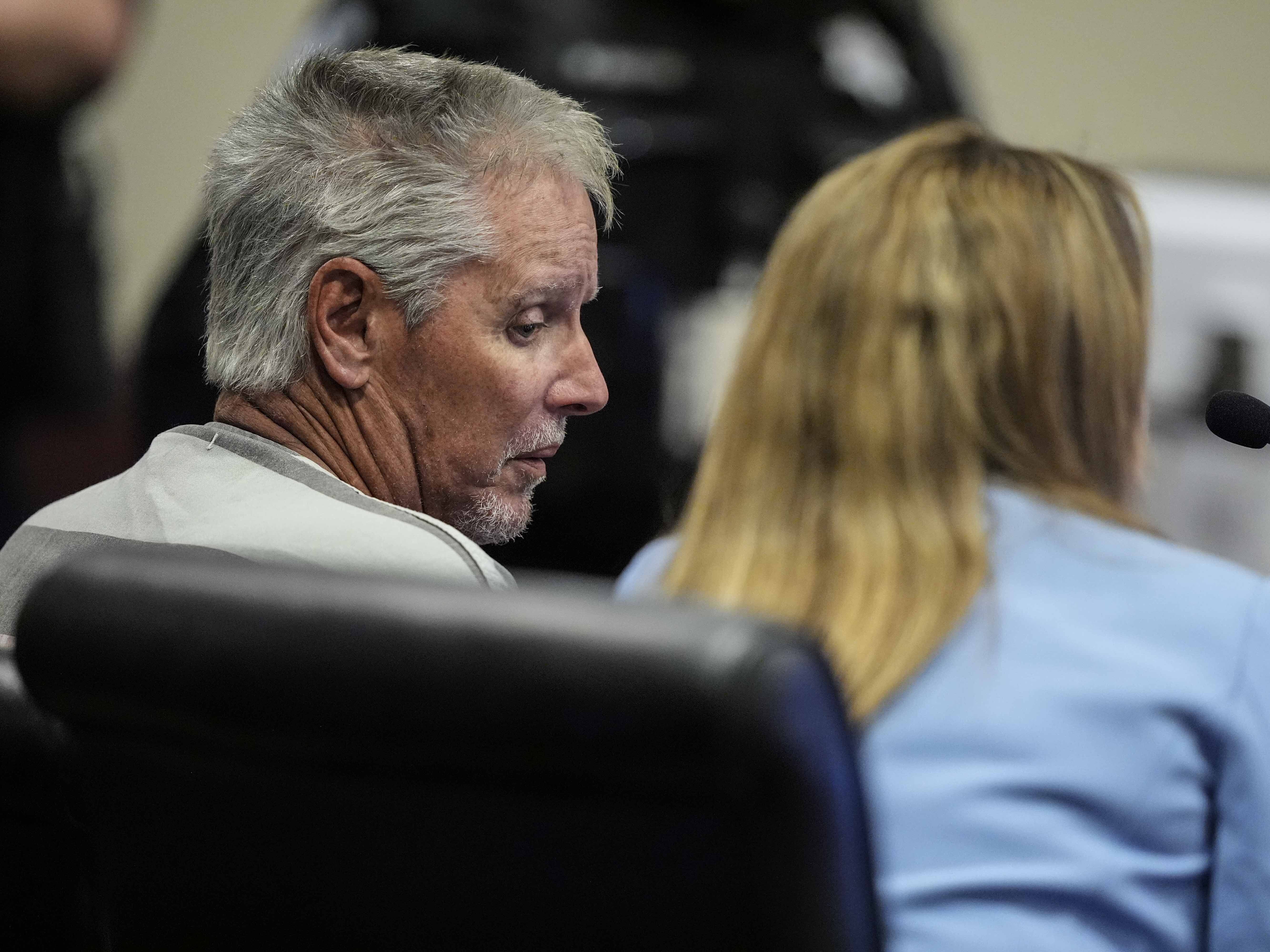 caption: Colin Gray, the father of Apalachee High School shooter Colt Gray, 14, sits in the Barrow County courthouse for his first appearance on Sept. 6, 2024, in Winder, Ga.