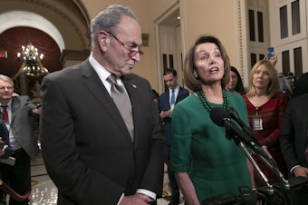caption: House Speaker-designate Nancy Pelosi, D-Calif., and Senate Minority Leader Chuck Schumer, D-N.Y., address reporters about the fight over funding a border wall before the partial government shutdown. Pelosi will lead House Democrats in voting on a bill to reopen the government when they take power in the House on Thursday.