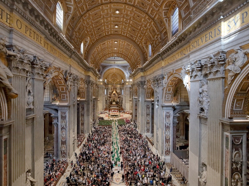 caption: Pope Francis and cardinals arrive at St. Peter's Basilica for the opening mass of the Amazon Synod on Oct. 6, 2019 in Vatican City.