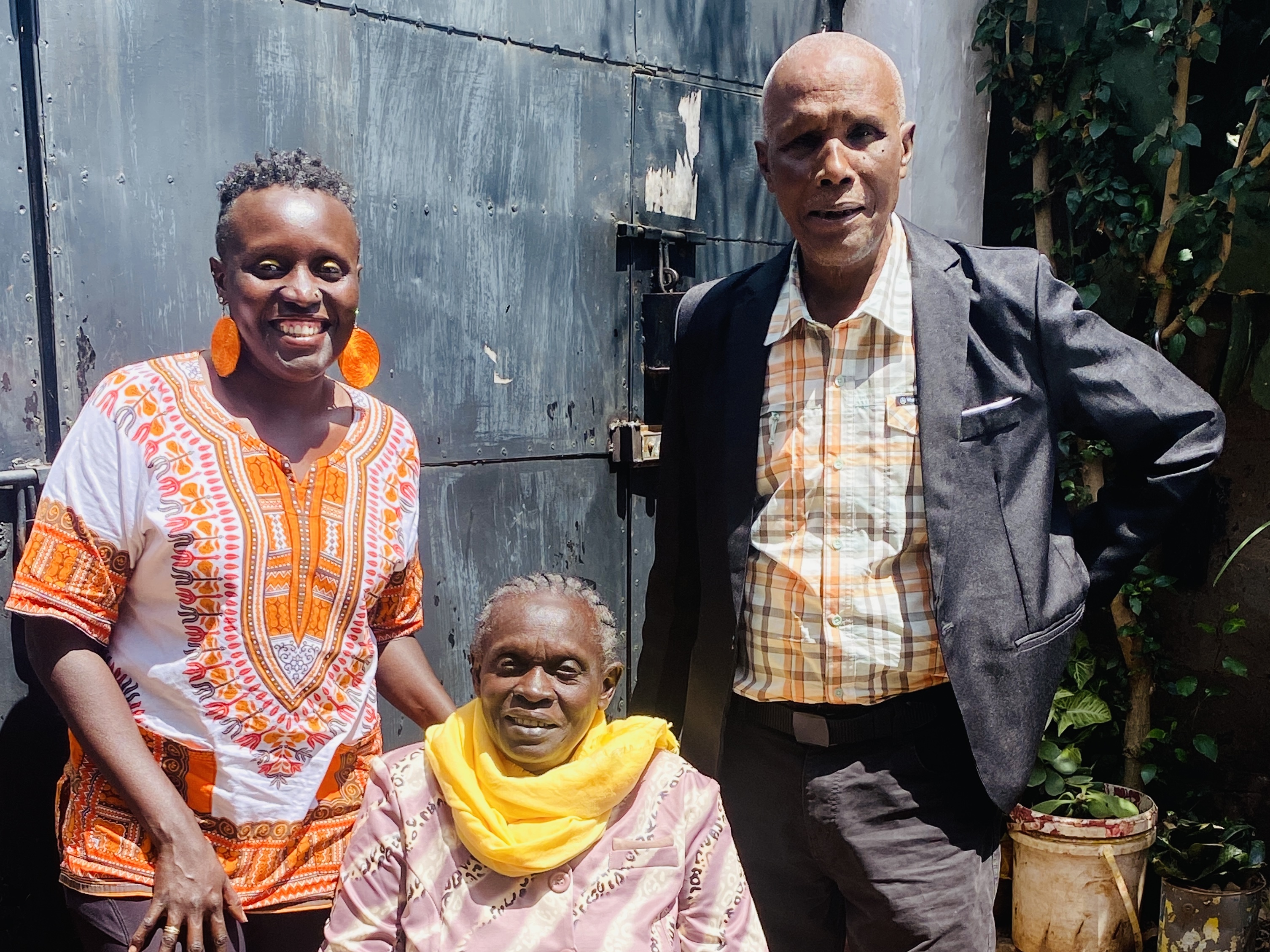 caption: Esther Ngumbi with her parents, Bertha and Harrison — both teachers. They were determined to give an education not only to their son but to their four daughters — even though neighbors told Harrison not to spent money on school for his daughters since they'd grow up, marry and leave the family.