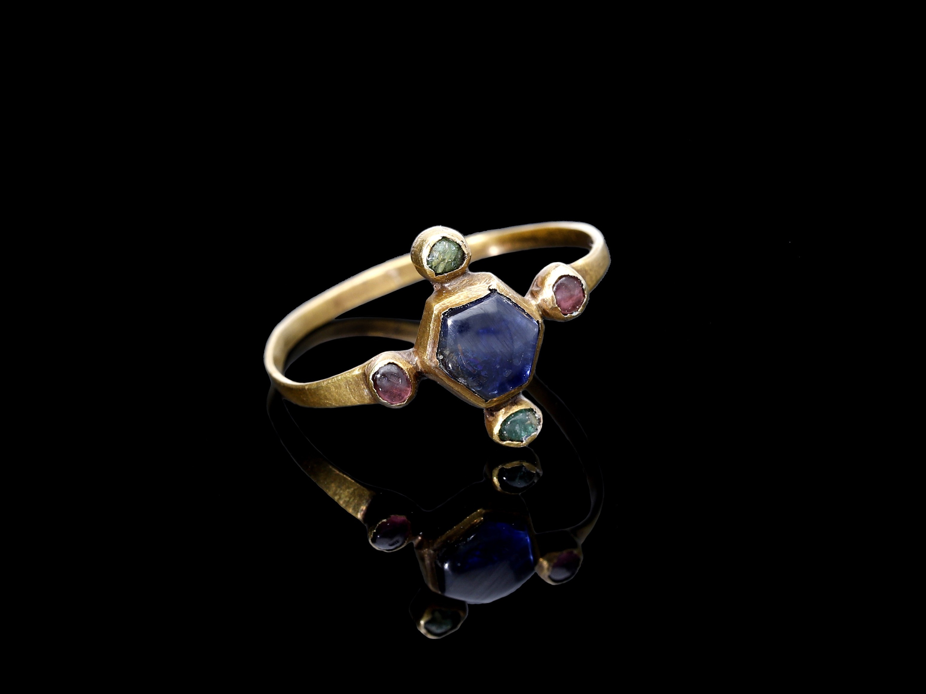 caption: The gold ring was uncovered in 2019.