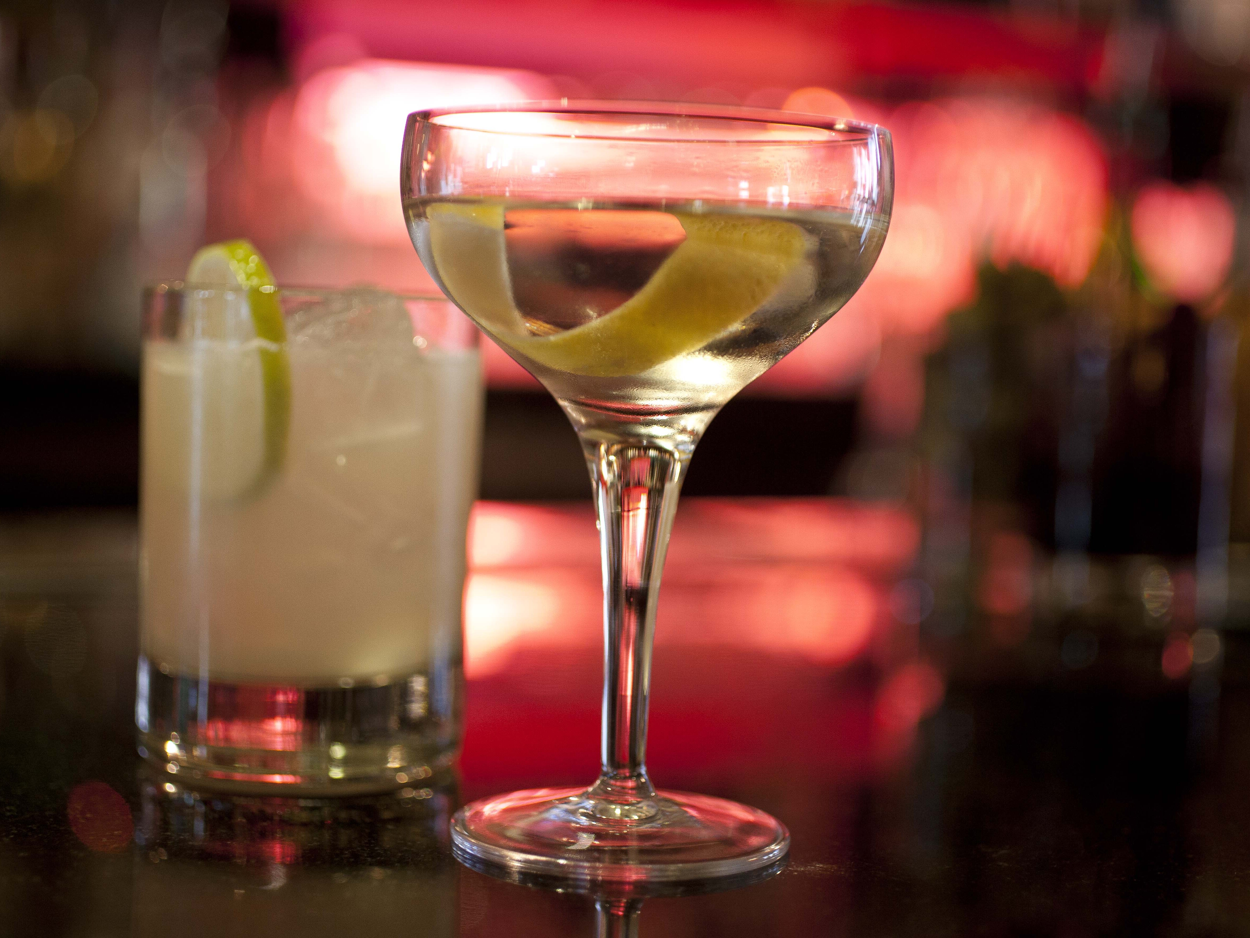 caption: An agave Margarita and gin Martini made by mixologist Jacques Bezuidenhout sit on a bar in the Starlight Room of the Sir Francis Drake Hotel in San Francisco, Dec. 20, 2012.