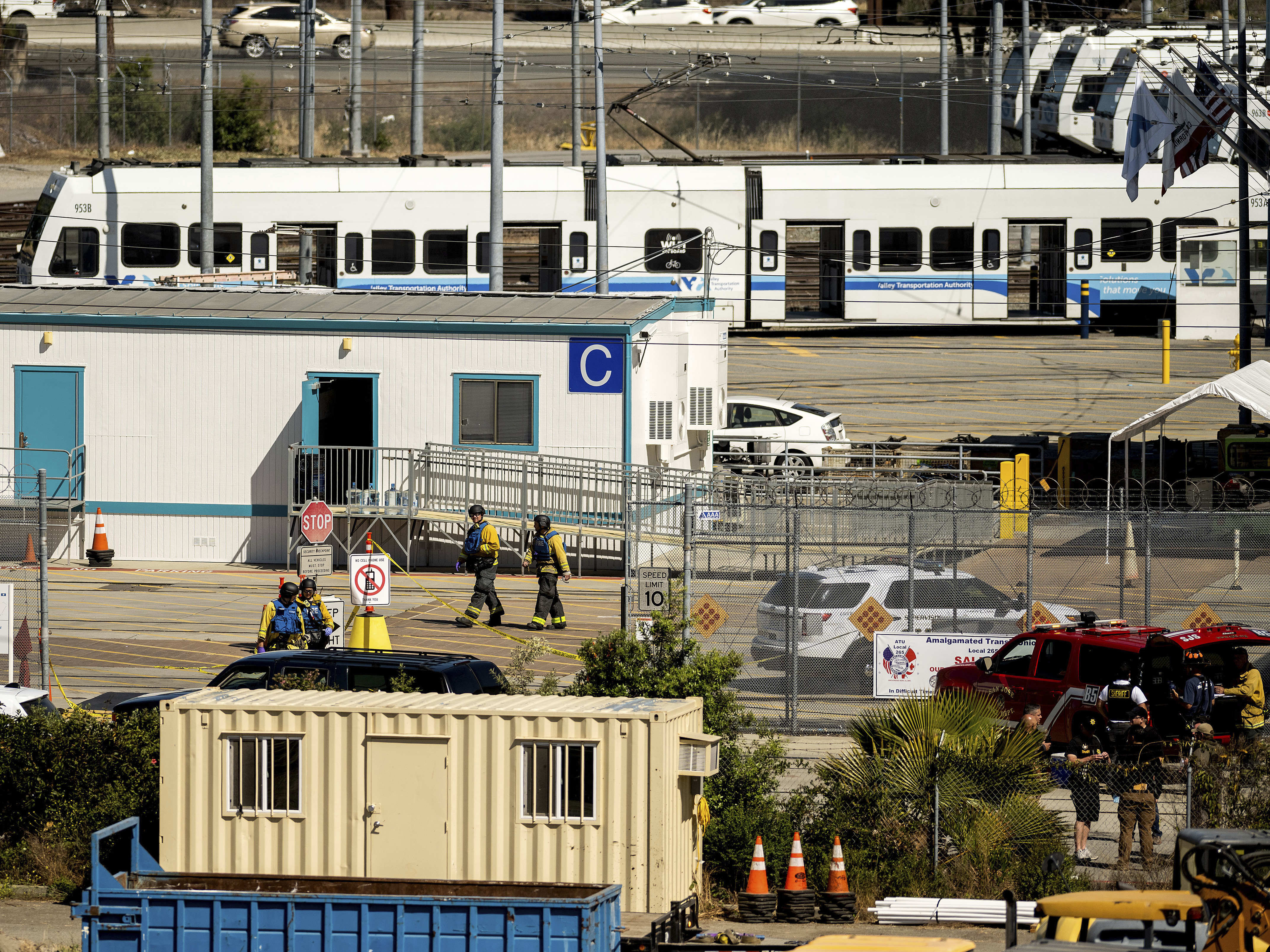 caption: Emergency personnel responded to reports of a shooting at a Santa Clara Valley Transportation Authority facility on Wednesday. The gunman killed nine people and took his own life.