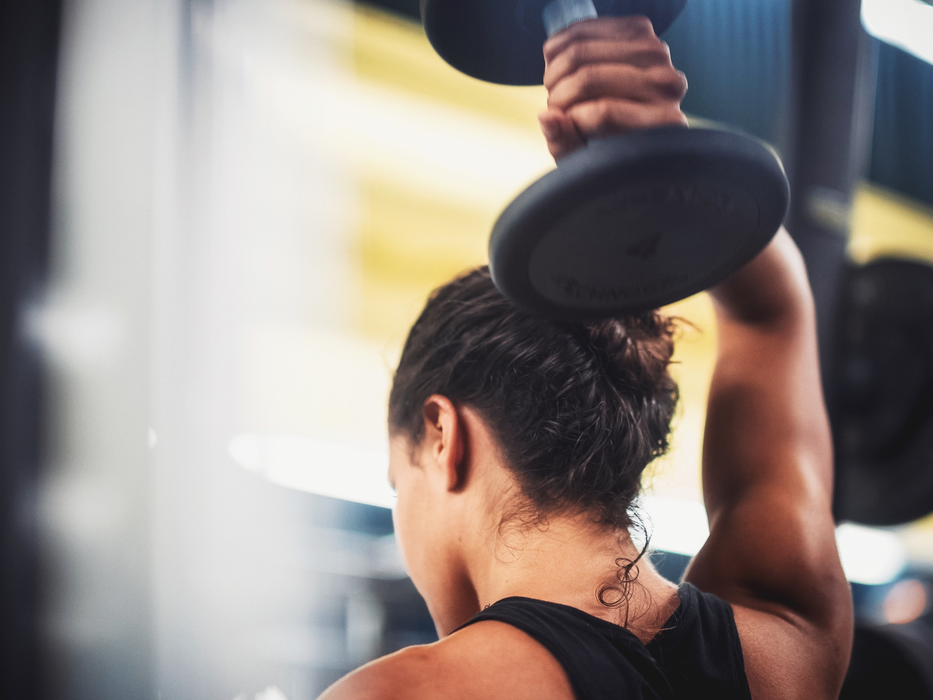 A writer and trauma therapist specialist explores how weight lifting can help heal emotional trauma.