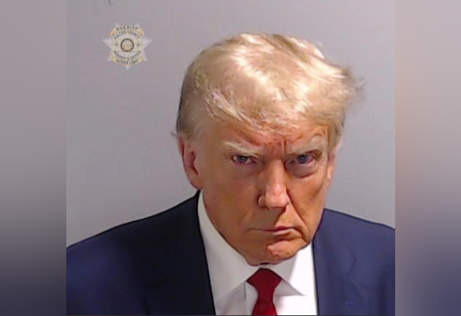 caption: Former President Donald Trump's mugshot after turning himself in Georgia on Aug. 24, 2023.