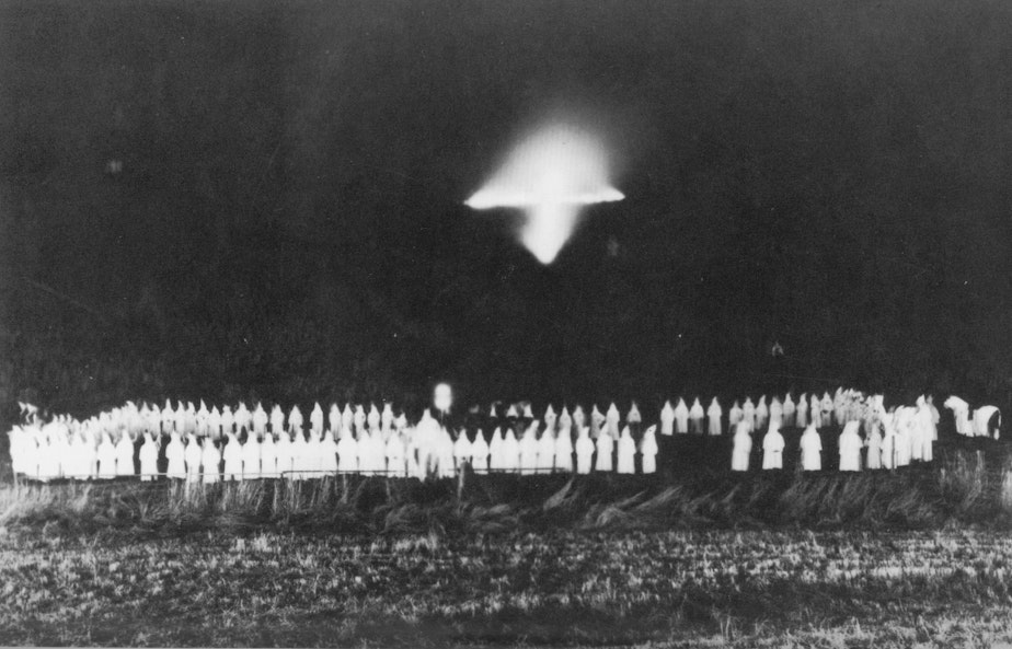 caption: The Ku Klux Klan had a major presence in the Pacific Northwest in the 1920s. This photo shows a rally in Issaquah, Washington, that drew well over 1,000 people. 