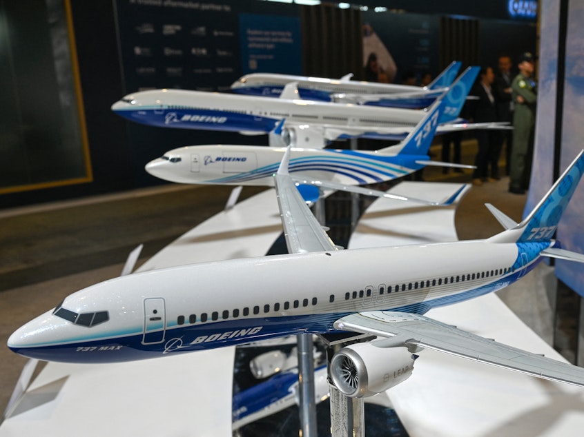 caption: Boeing announced a management shakeup - including the ouster of the leader of the 737 Max production line. At the Singapore Airshow, miniature models of Boeing aircraft including the 737 Max (front) are displayed on February 21, 2024.