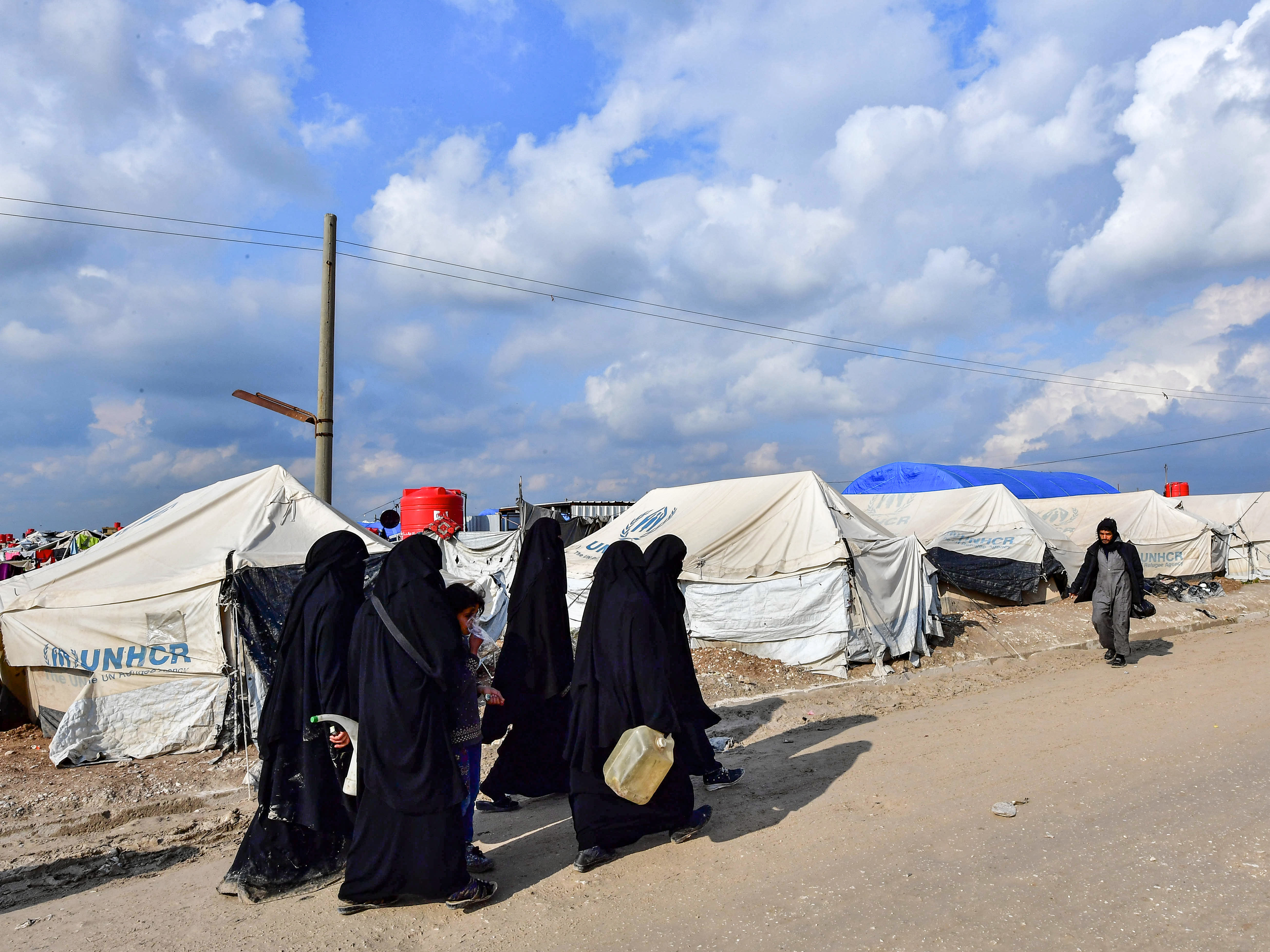 caption: Hoda Muthana was held in al-Hol camp, which houses relatives of Islamic State group members in northeastern Syria. She was recently transferred to a different detention camp.