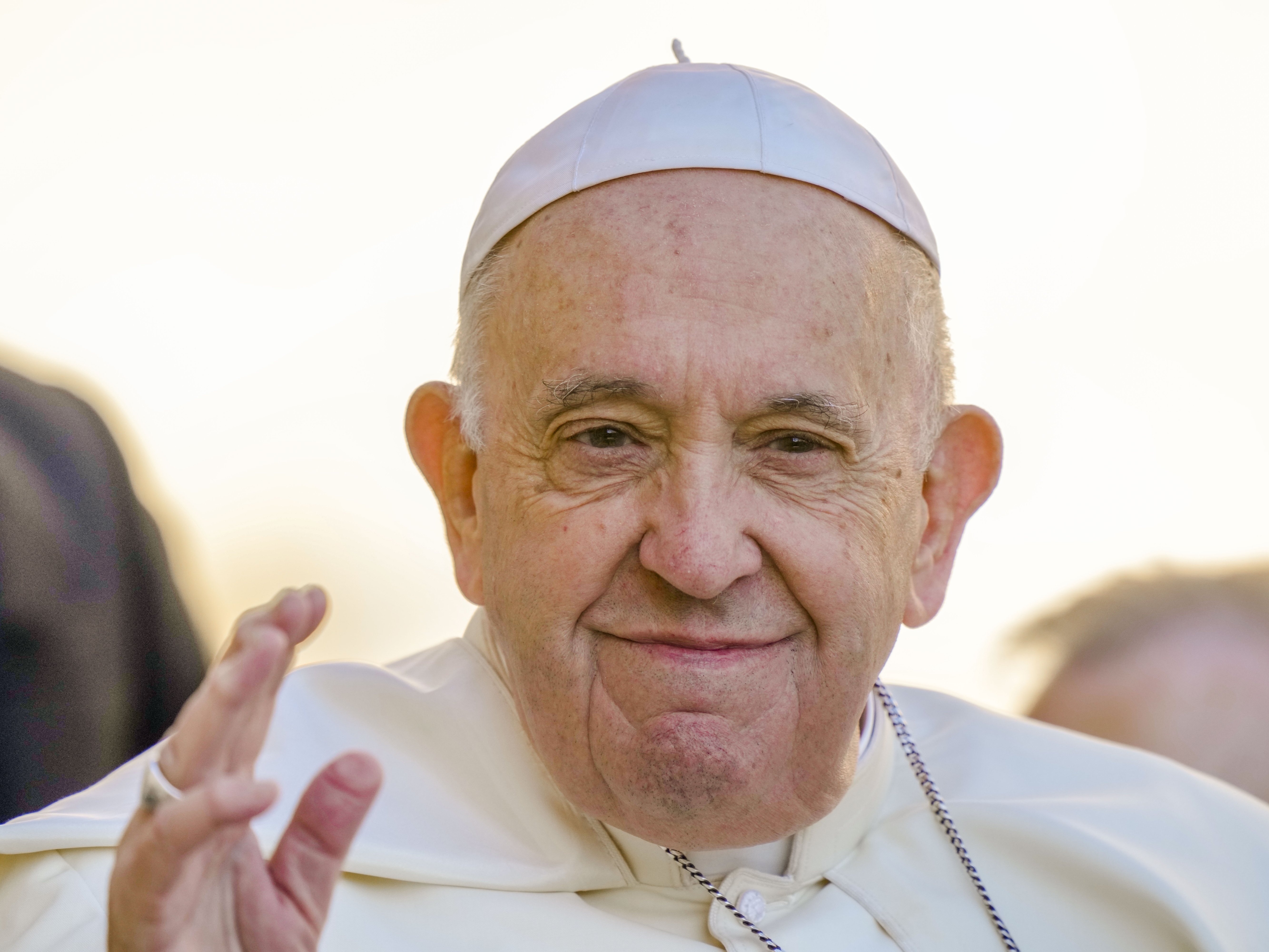 caption: Pope Francis arrives for his weekly general audience in St. Peter's Square at the Vatican.