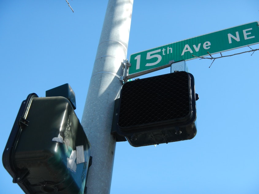 caption: The small speakers at certain intersections in Seattle emit a tone to signal when it is safe to cross for the blind or visually impaired.